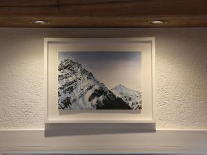 een foto van een berg op een muur bij Apartment Armorial II - apt 2 by Interhome in Villars-sur-Ollon