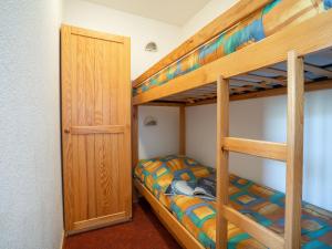 Postel nebo postele na pokoji v ubytování Apartment Sarvan 404 by Interhome