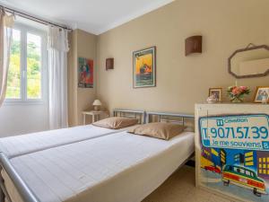 Postel nebo postele na pokoji v ubytování Holiday Home Le Cèdre by Interhome