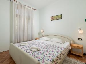 Postel nebo postele na pokoji v ubytování Holiday Home Petra by Interhome