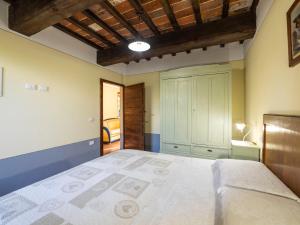 Posteľ alebo postele v izbe v ubytovaní Holiday Home La Capannina by Interhome