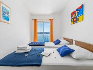 Postel nebo postele na pokoji v ubytování Apartment Marina-8 by Interhome