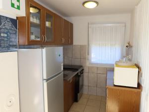 Kuchyňa alebo kuchynka v ubytovaní Holiday Home Tin by Interhome