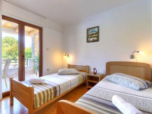 Posteľ alebo postele v izbe v ubytovaní Holiday Home Villa Anamaria by Interhome