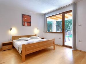 Posteľ alebo postele v izbe v ubytovaní Holiday Home Villa Anamaria by Interhome
