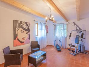 a room with a gym with exercise equipment at Holiday Home Le Querce - PIT550 by Interhome in Atri