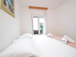 Postel nebo postele na pokoji v ubytování Apartment Sablić-2 by Interhome