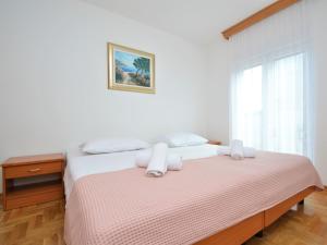 Postel nebo postele na pokoji v ubytování Apartment Sablić-2 by Interhome