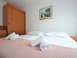 Postel nebo postele na pokoji v ubytování Apartment Sablić-2 by Interhome
