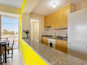 A kitchen or kitchenette at Apartment Carnaval by Interhome