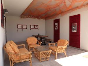 Posedenie v ubytovaní Apartment Viva-by the sea-garden & terraces by Interhome