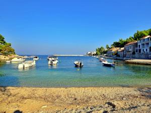 a group of boats are docked in a river at Holiday Home Peter by Interhome in Prigradica