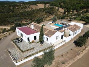 an aerial view of a house with a swimming pool at Finca El Jaral in Santa Elena