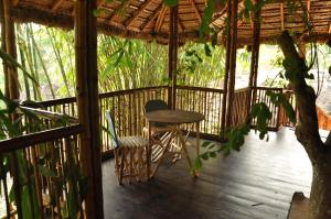 Balkón nebo terasa v ubytování Uravu Bamboo Grove Resort