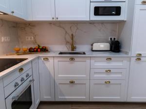 Kuchyň nebo kuchyňský kout v ubytování Suitur Milenium apartamento Marbella playa Venus