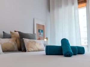 Postel nebo postele na pokoji v ubytování Suitur Milenium apartamento Marbella playa Venus
