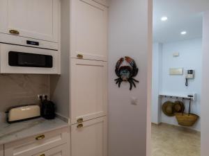 Kuchyň nebo kuchyňský kout v ubytování Suitur Milenium apartamento Marbella playa Venus