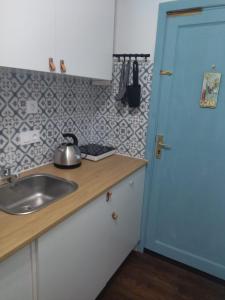Kuchyň nebo kuchyňský kout v ubytování Azul apartment with sea view