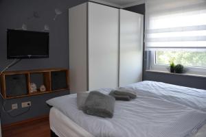 Ein Bett oder Betten in einem Zimmer der Unterkunft Ferienhaus 8erwassereck