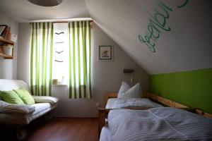 Ein Bett oder Betten in einem Zimmer der Unterkunft Ferienhaus 8erwassereck