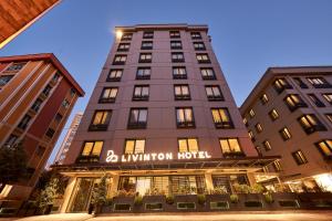 a building with a sign that reads b livington hotel at Livinton İstanbul Ataşehir in Istanbul