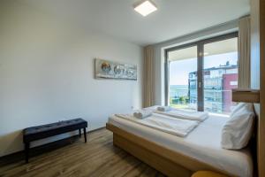 Posteľ alebo postele v izbe v ubytovaní MyFlat Casa Coral Apartment + 22 fotografií