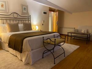 Postel nebo postele na pokoji v ubytování Corzo Hotel