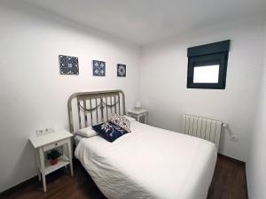 Posteľ alebo postele v izbe v ubytovaní Family Cuenca