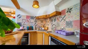 Kuchyň nebo kuchyňský kout v ubytování Apartment Ernestova hiša