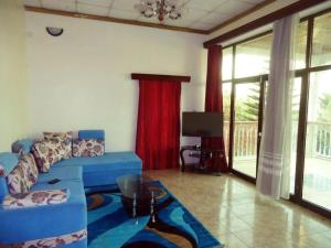 Χώρος καθιστικού στο Golf View Apartment