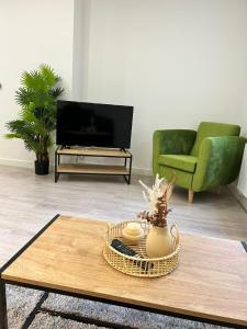 a living room with a couch and a coffee table at Luxury 1-Bed Town Centre Platform South Stevenage in Stevenage