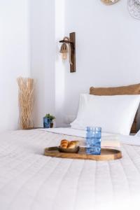 Postel nebo postele na pokoji v ubytování Love suite mykonos town
