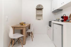 Kuchyň nebo kuchyňský kout v ubytování Love suite mykonos town