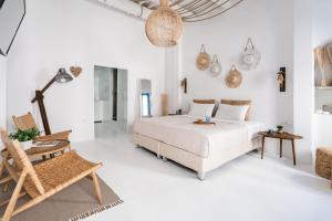 Postel nebo postele na pokoji v ubytování Love suite mykonos town