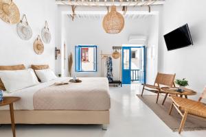 Postel nebo postele na pokoji v ubytování Love suite mykonos town