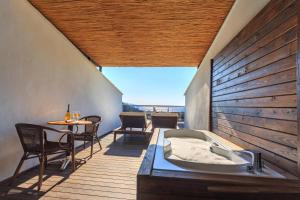 Posezení v ubytování Manaspark Deluxe Hotel