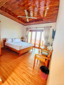 Postel nebo postele na pokoji v ubytování Viet Thanh Resort