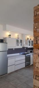 Kuchyň nebo kuchyňský kout v ubytování Finca La Malvina + 28 fotografií