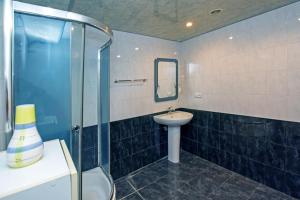 Koupelna v ubytování LeSi Apartament + 11 fotografií