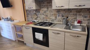 A kitchen or kitchenette at Casa Vacanza Giorgia 2.0