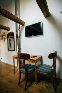 TV a/nebo společenská místnost v ubytování Antonio Residence + 23 fotografií