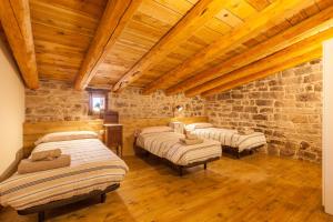Posteľ alebo postele v izbe v ubytovaní Masia Can Pla