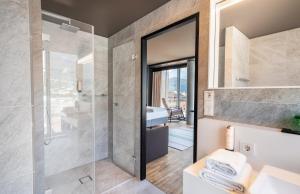Vannituba majutusasutuses aDLERS Hotel Innsbruck