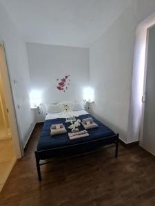 Postel nebo postele na pokoji v ubytování Curti Granda