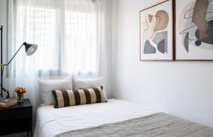 Posteľ alebo postele v izbe v ubytovaní PRECIOSO APARTAMENTO EN MARIA ZAMBRANO