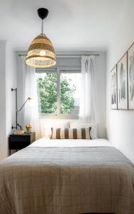 Posteľ alebo postele v izbe v ubytovaní PRECIOSO APARTAMENTO EN MARIA ZAMBRANO