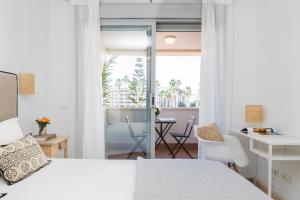 Posteľ alebo postele v izbe v ubytovaní PRECIOSO APARTAMENTO EN MARIA ZAMBRANO