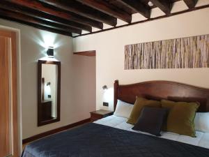 Cama o camas de una habitación en Hotel Rural Casablanca