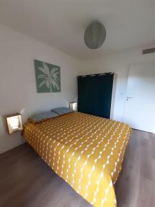 Posteľ alebo postele v izbe v ubytovaní Dune Blanche 300 m de l'Océan, appartement neuf 6 personnes