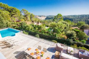 an aerial view of a villa with a swimming pool at Villa Les Feuillets VI4250 by Riviera Holiday Hom in Roquefort-les-Pins